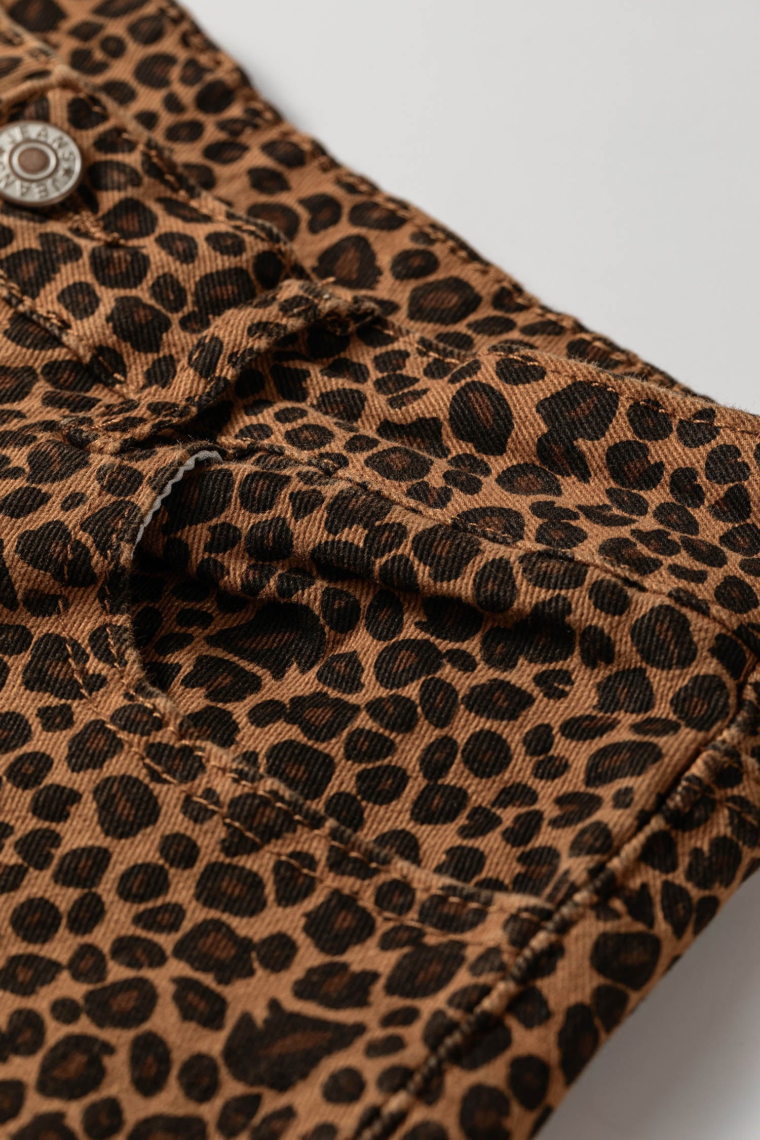 Leopard Ruffle Hem Shift Jeans